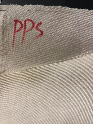 Un buen precio. Temperatura alta tejida PTFE de la tela 200GSM del filtro del geotextil del PPS en línea